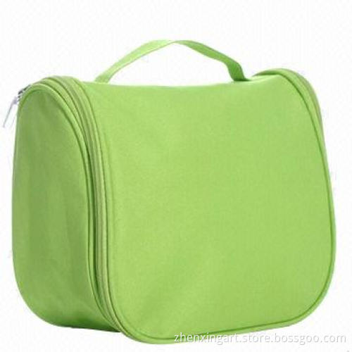 Multifunctional toiletry bag with hanger and carry handle